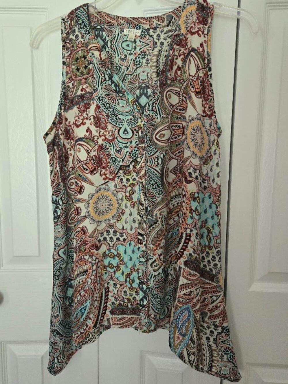 Sleeveless flowy shirt